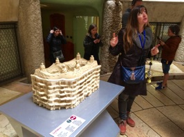 For Gaudi's third act today, we visited Casa Milà or La Pedrera.  It is Gaudi's last civil work and was completed in 1912. Here, our local guide shows us a model of the project.