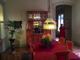 Typical dining room furnishings.  The original dining room on the first floor must have been much more spacious since the first floor alone was about 13,000 square feet.