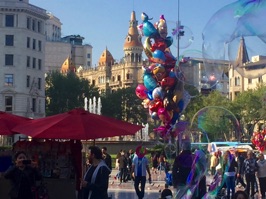 After we checked into the hotel, our tour leader, Africa, took us on a brief walking tour of Barcelona.  The city was very crowded. Here in the Plaça de Catalunya, we encountered lots of balloons and giant bubbles.
