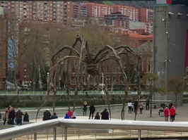 Maman by the French-American artist Louise Bourgeois. Meaning "mother" in French, some like to have a photo taken while leaning against one of the legs of the spider.