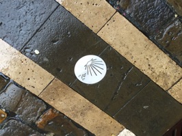 Pamplona is also on one of the pilgrim's routes on the way to Santiago.  Here is the familiar marker in the pavement.