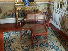 Furniture to accommodate the dresses of the time.