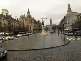 The Porto City Hall is in the distance with a statue of Peter IV in the foreground in Freedom Square.