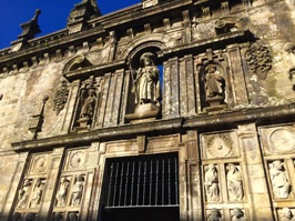 St. James, the Apostle in the center with scallop shells on the facade below.