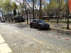 Not sure why cars were blocked off like this but a large number of streets had cars and parking spaces blocked off on this day which was a religious holiday for many (Good Friday). Not sure why cars were blocked off like this but a large number of streets had cars and parking spaces blocked off on this day which was a religious holiday for many (Good Friday).